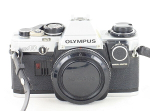 Olympus OM-10 35mm SLR body c/w Manual adapter in case
